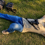 Filmmaker Raman Rishi Dwivedi resting with his camera during a documentary shoot